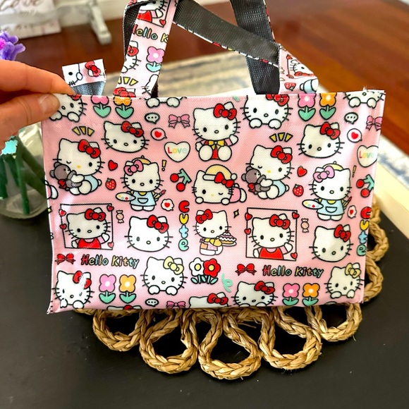 💗🆕Hello Kitty waterproof bag with Mini notebook and Pen! Adorable! New! - Picture 3 of 5